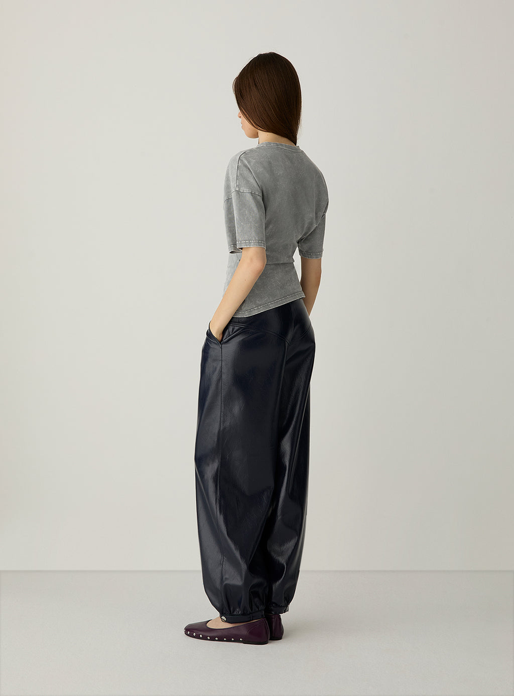 Riley Navy Balloon Pants by LAAGAM — women's wide-leg trousers, three-quarter back view