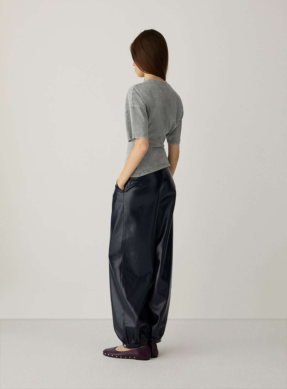 Riley Navy Balloon Pants by LAAGAM — women's wide-leg trousers, three-quarter back view